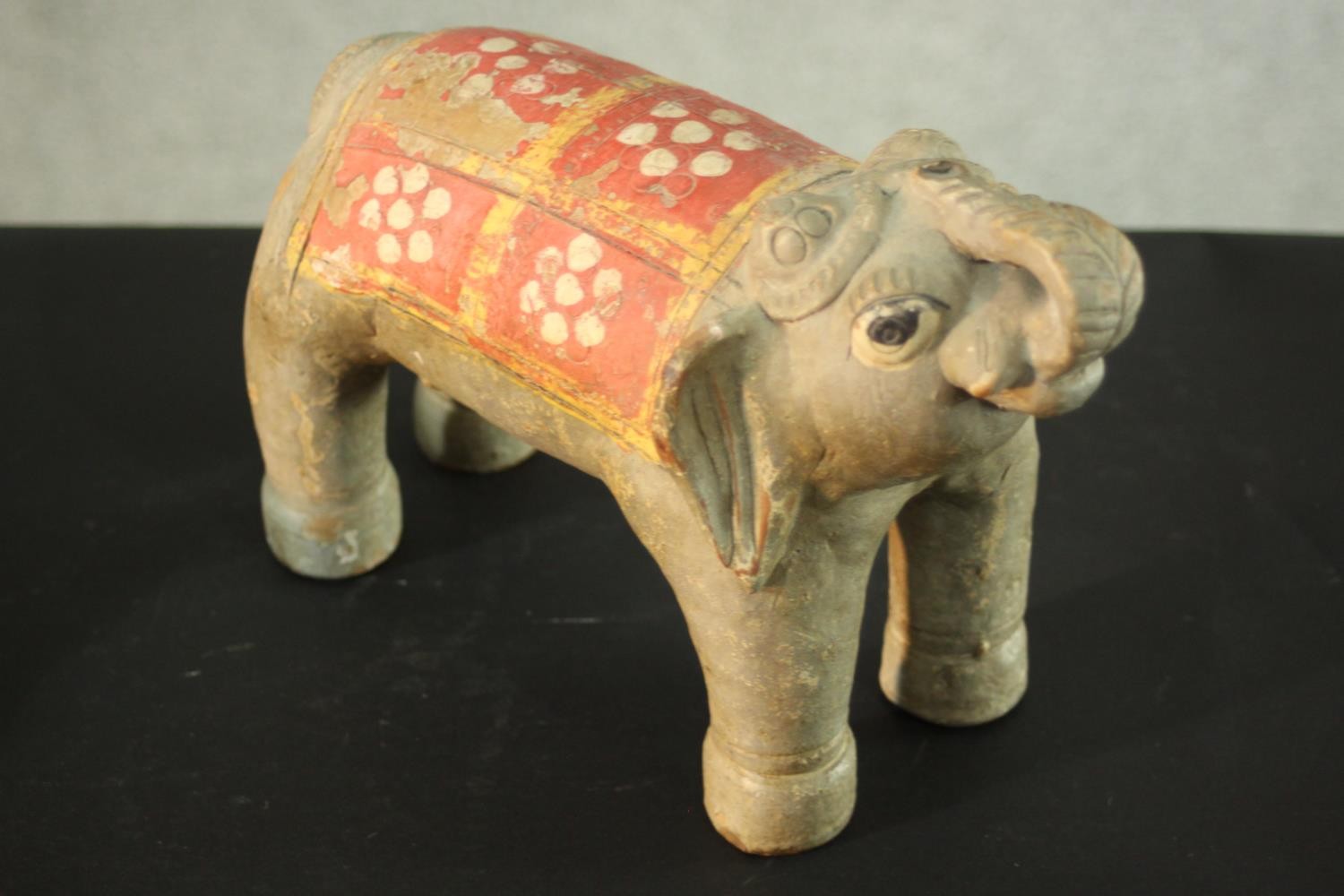 A terracotta figure of a couple, along with a ceramic elephant and a ceramic horse. H.30 W.30 D.6 - Image 9 of 11