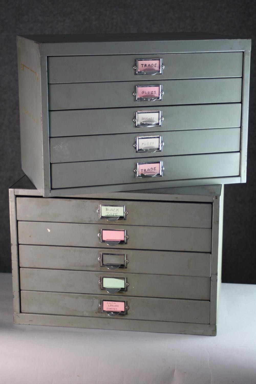 A pair of metal desk top specimen or stationery cabinets. H.30 W.45 D.30 cm (each)