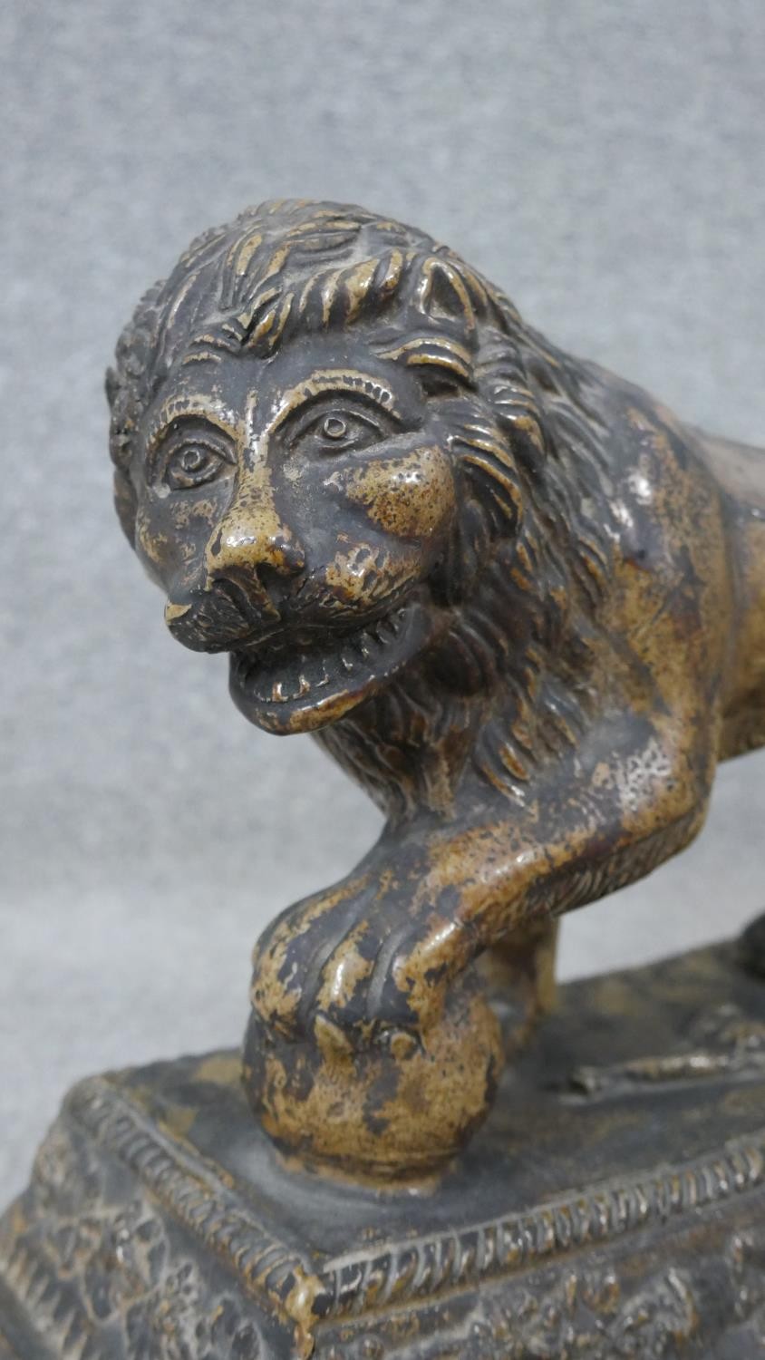 An early 19th century Staffordshire pearlware ceramic lion with ball, sitting on a rectangular - Image 3 of 8