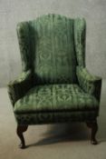 Armchair, Georgian style wingback on mahogany cabriole supports.