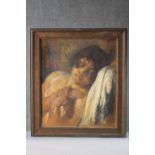 A framed pastel portrait of a young woman reclining in a chair. Indistinctly signed. H.58 W.50cm.