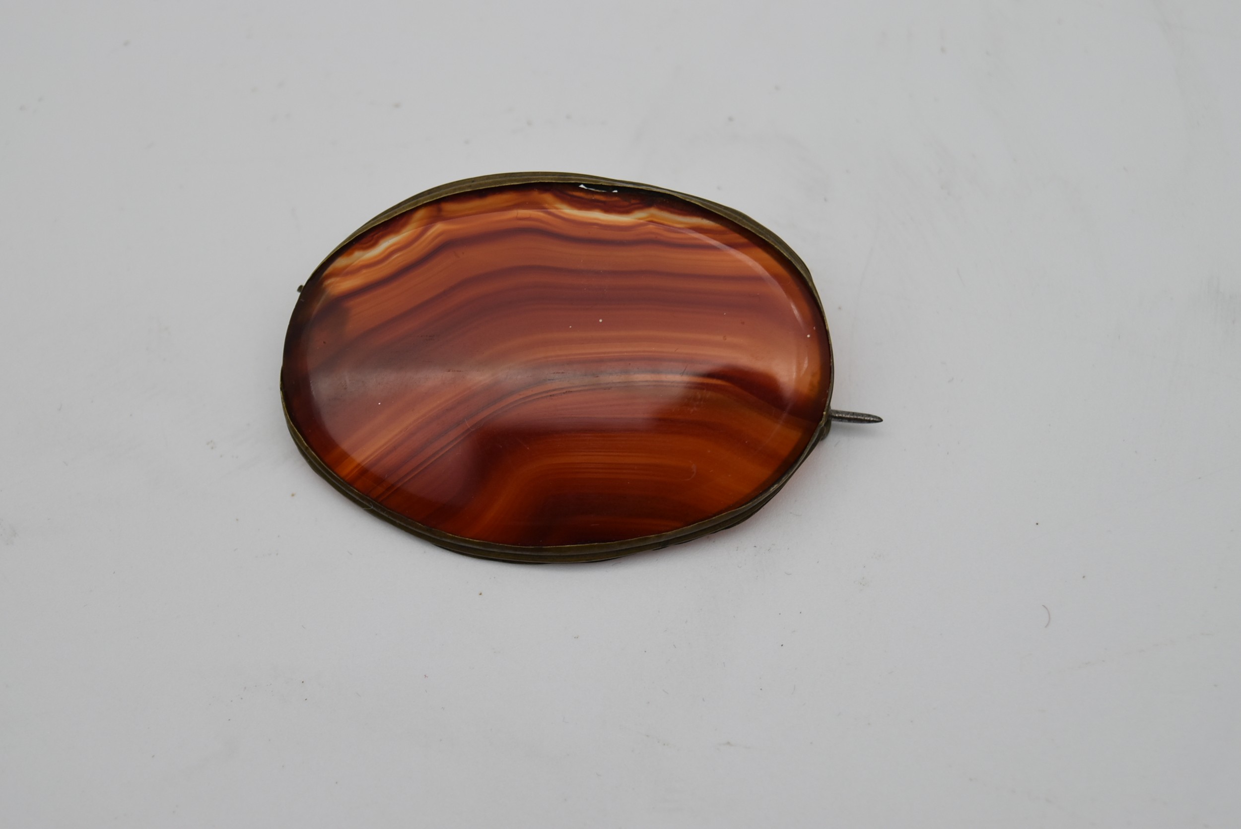 An antique Carnelian oval brooch with a secure pin to the reverse. L.7cm - Image 2 of 4