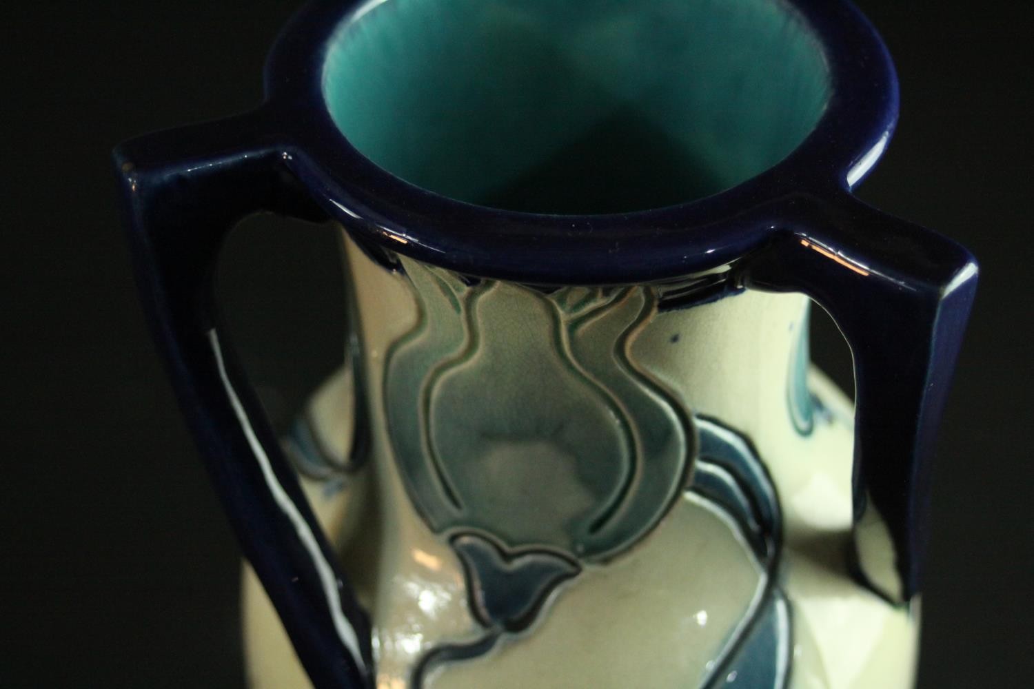 An early 20th century Burmantofts Faience three handled vase with incised Wild Tulip decoration in - Image 3 of 5