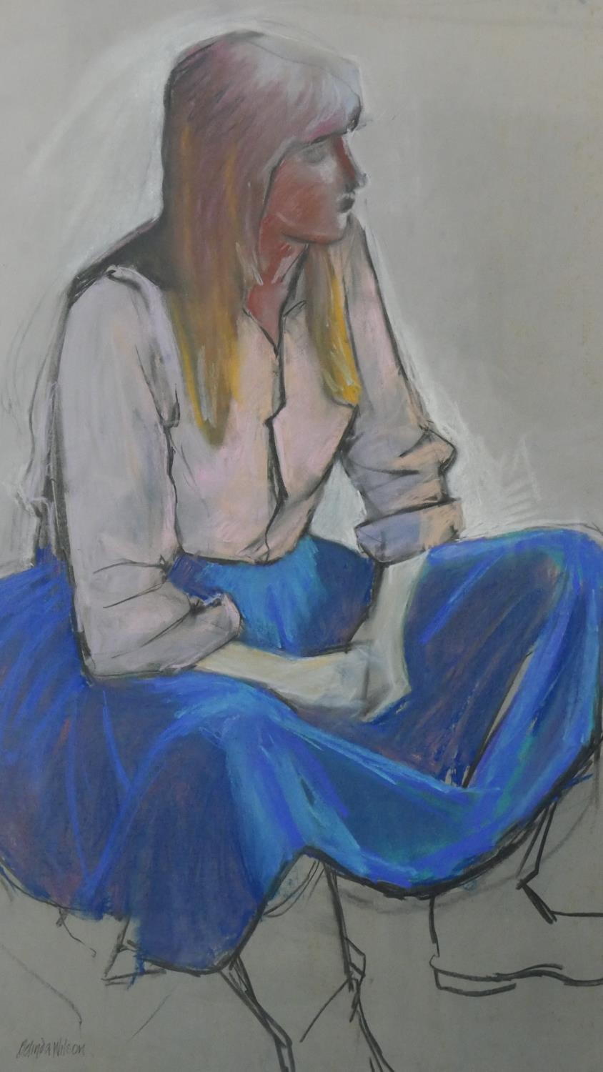 Belinda Wilson (1954-) A framed and glazed pastel on paper of a seated woman in blue skirt. Signed - Image 3 of 7