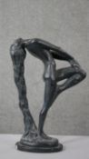 A vintage cast plaster Art Deco style figure of a dancing woman. Signed Austin Prodins, 1979 to