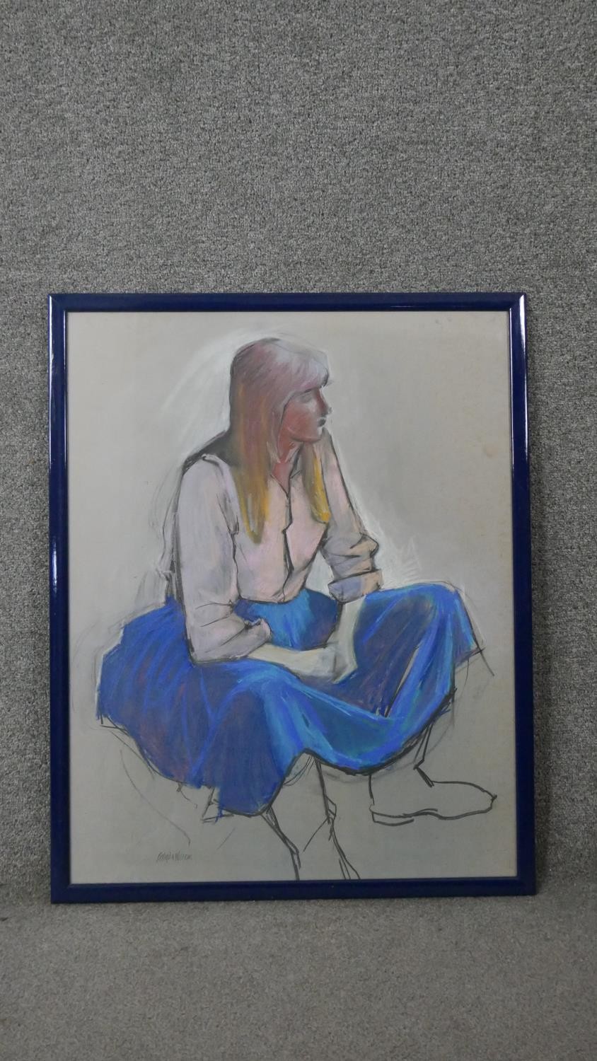 Belinda Wilson (1954-) A framed and glazed pastel on paper of a seated woman in blue skirt. Signed