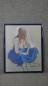 Belinda Wilson (1954-) A framed and glazed pastel on paper of a seated woman in blue skirt. Signed
