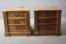 A pair of modern teak three drawer bedside cabinets. H.64 W.64 D.50 cm.