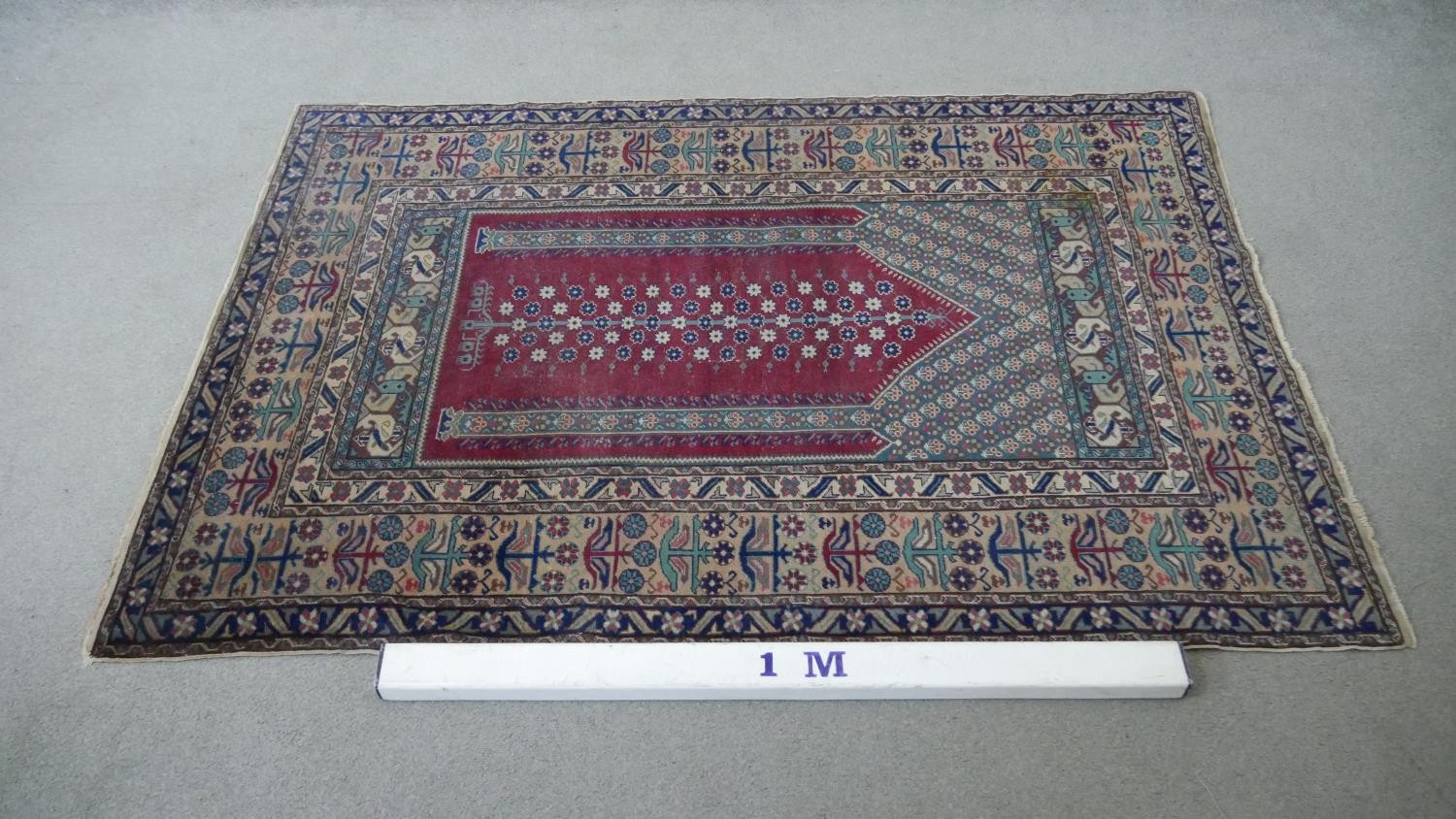 A Turkish Kayseri prayer mat with burgundy ground and floral multiple borders. L.170 W.115cm - Image 2 of 7