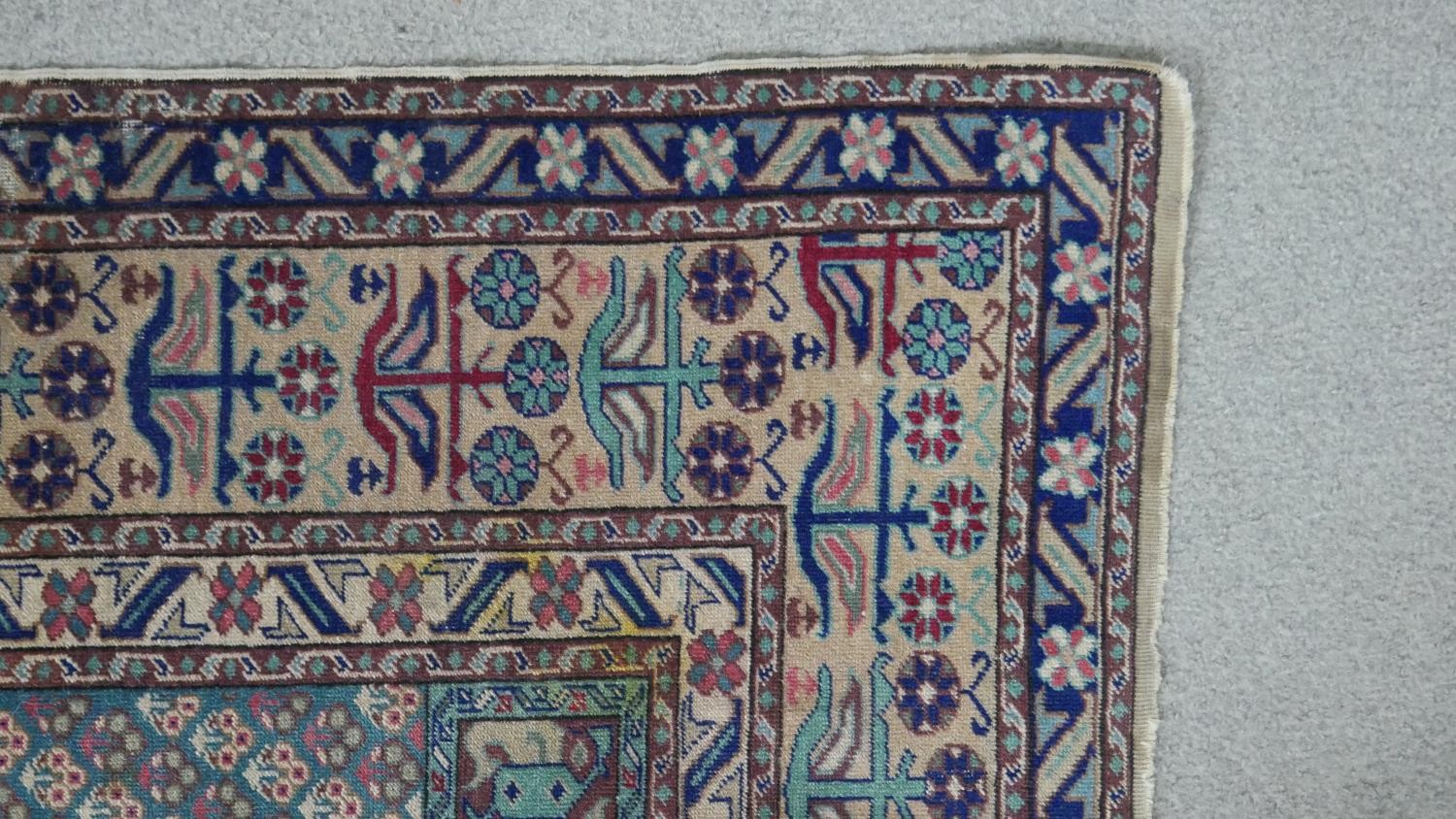 A Turkish Kayseri prayer mat with burgundy ground and floral multiple borders. L.170 W.115cm - Image 5 of 7