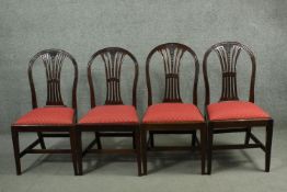 Dining chairs, a set of four Georgian mahogany with wheatsheaf carved splats.