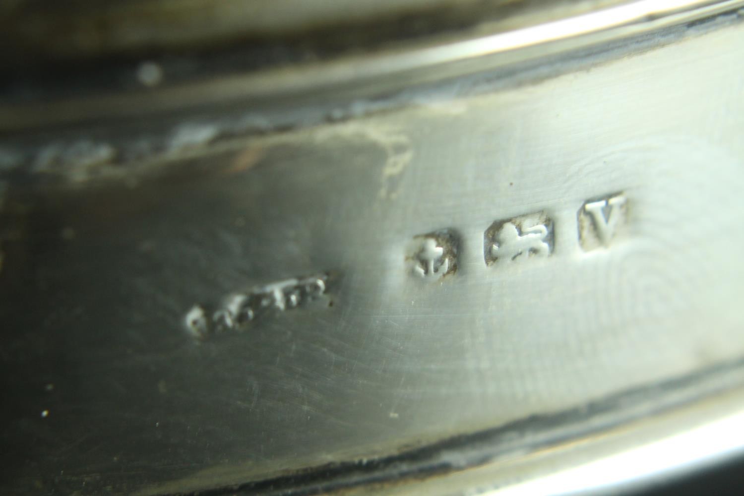 An 1920's hinged lidded silver box with scalloped edge and on tripod feet. Gilded interior and - Image 8 of 8