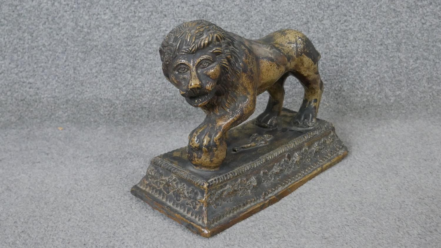 An early 19th century Staffordshire pearlware ceramic lion with ball, sitting on a rectangular - Image 2 of 8