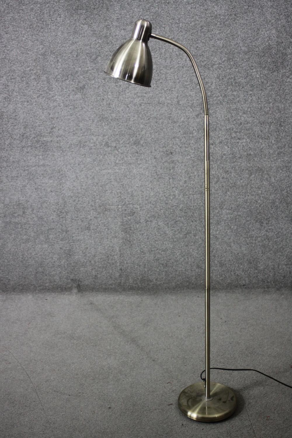 Standard reading lamp. contemporary, adjustable. H.150cm.