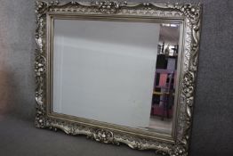 Wall mirror, contemporary Rococo style with bevelled plate. H.126 W.154cm.