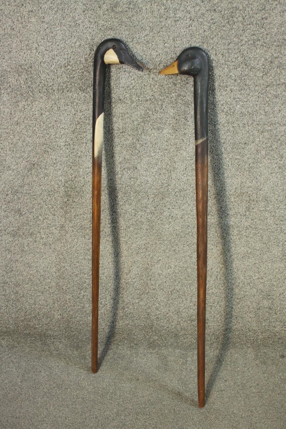 Two walking sticks with carved and painted duck head handles. L.90 cm. - Image 2 of 4