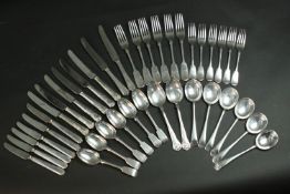 A six person set of silver plated cutlery and a pair of serving spoons and two knives. Each set of