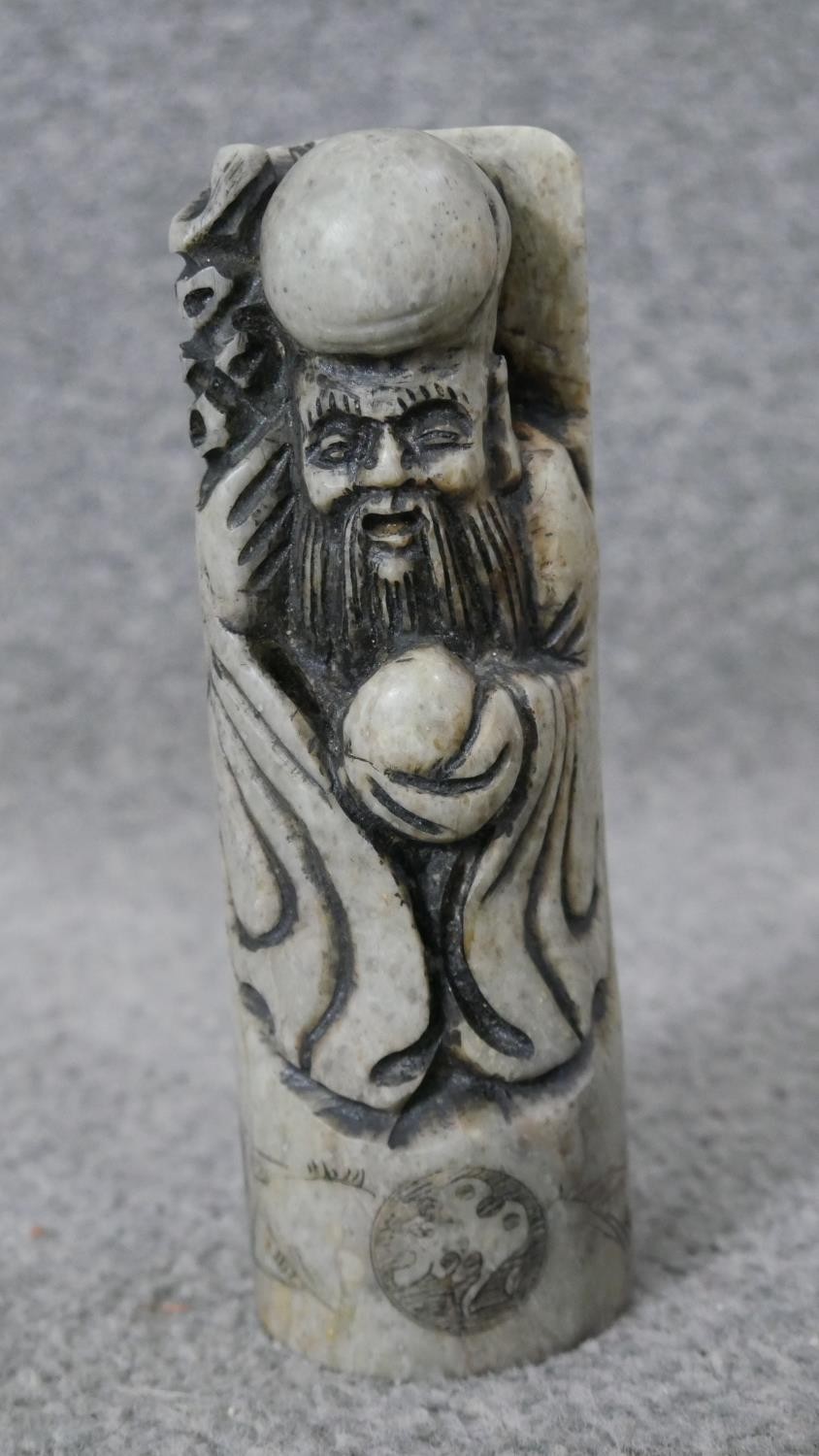A carved Chinese soapstone chop in the form of an immortal along with two Indian brass deities on - Image 3 of 10