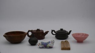 A collection of 20th century oriental ceramics. Including a pale pink glaze tea bowl, two Yixing