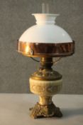 A Swedish copper and brass oil lamp with ceramic body and milk glass shade. H.54 Dia.26cm.