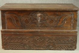 Coffer, 19th century carved Indian teak. H.64 W.114 D.52cm.