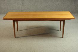 Coffee table, mid century teak, Gordon Russell Limited with maker's label. H.40 W.122 D.44cm.