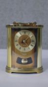 A H.S. Samuel quartz brass carriage clock. H.12 W.10 D.7cm