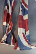 Two halves of a Union Jack, together forming a large wall hanging. H.350 W.130 cm.