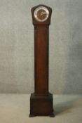 A mid century Art Deco style oak cased Enfield clock company chiming Grandmother clock. H.143 W.