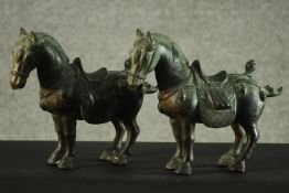 A pair of bronze Chinese Tang style horses. H.26 W.26 D.9 cm.