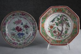 Two 19th century hand painted porcelain plates. One famille rose with birds and flowers and one