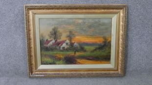 J. Cole (19th Century) A gilt framed oil on canvas of a countryside landscape with cottages.