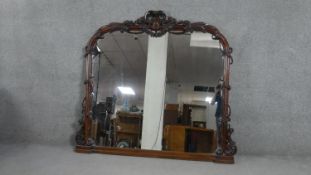 Overmantel mirror, Victorian mahogany well carved with swags, berries and scrolling foliate