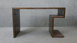 A contemporary writing table from polished rough hewn timbers. H.76 W.126 D.59 cm