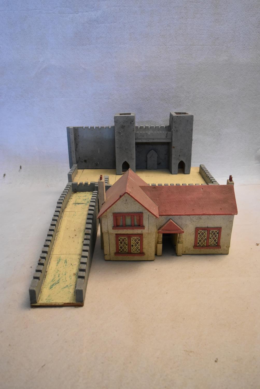 A vintage painted toy castle along with a vintage model of a country cottage. H.41 W.64 D.90cm - Image 2 of 10