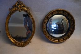 A Regency style gilt framed convex wall mirror and a mid century gilt framed mirror with floral