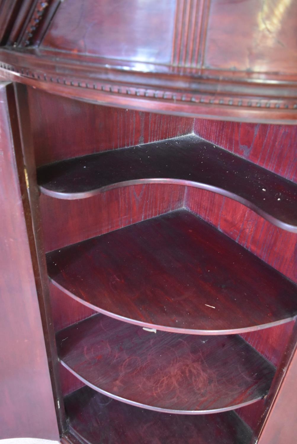 A Georgian mahogany bowfronted hanging corner cabinet with arched pediment and urn finials and - Image 3 of 10