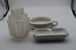 An Art Deco porcelain soap holder, an Art Deco frosted glass light shade and a late 19th century