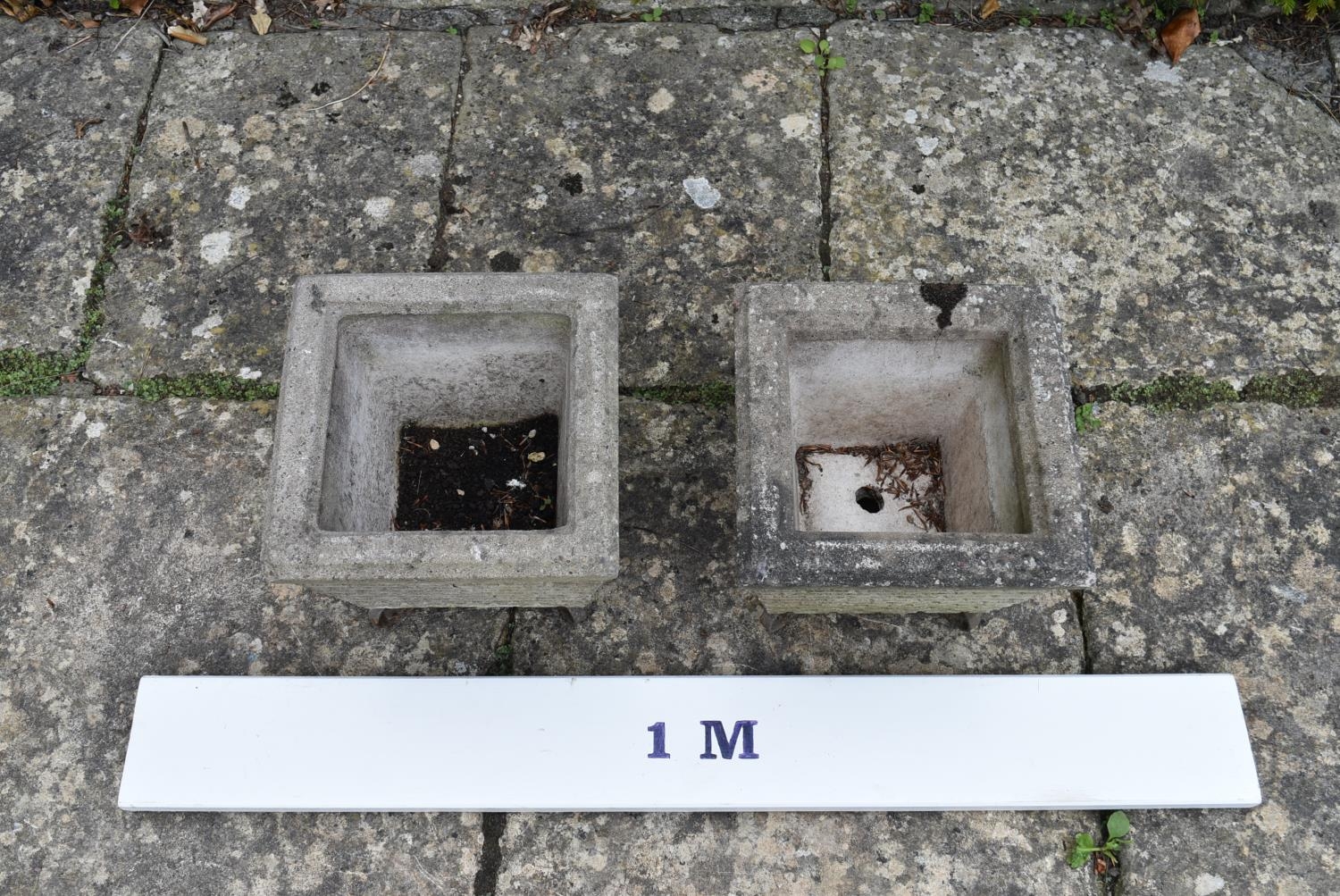 A pair of reconstituted garden planters on scrolling wrought metal bases. H.28 W.28 D.28cm - Image 2 of 5