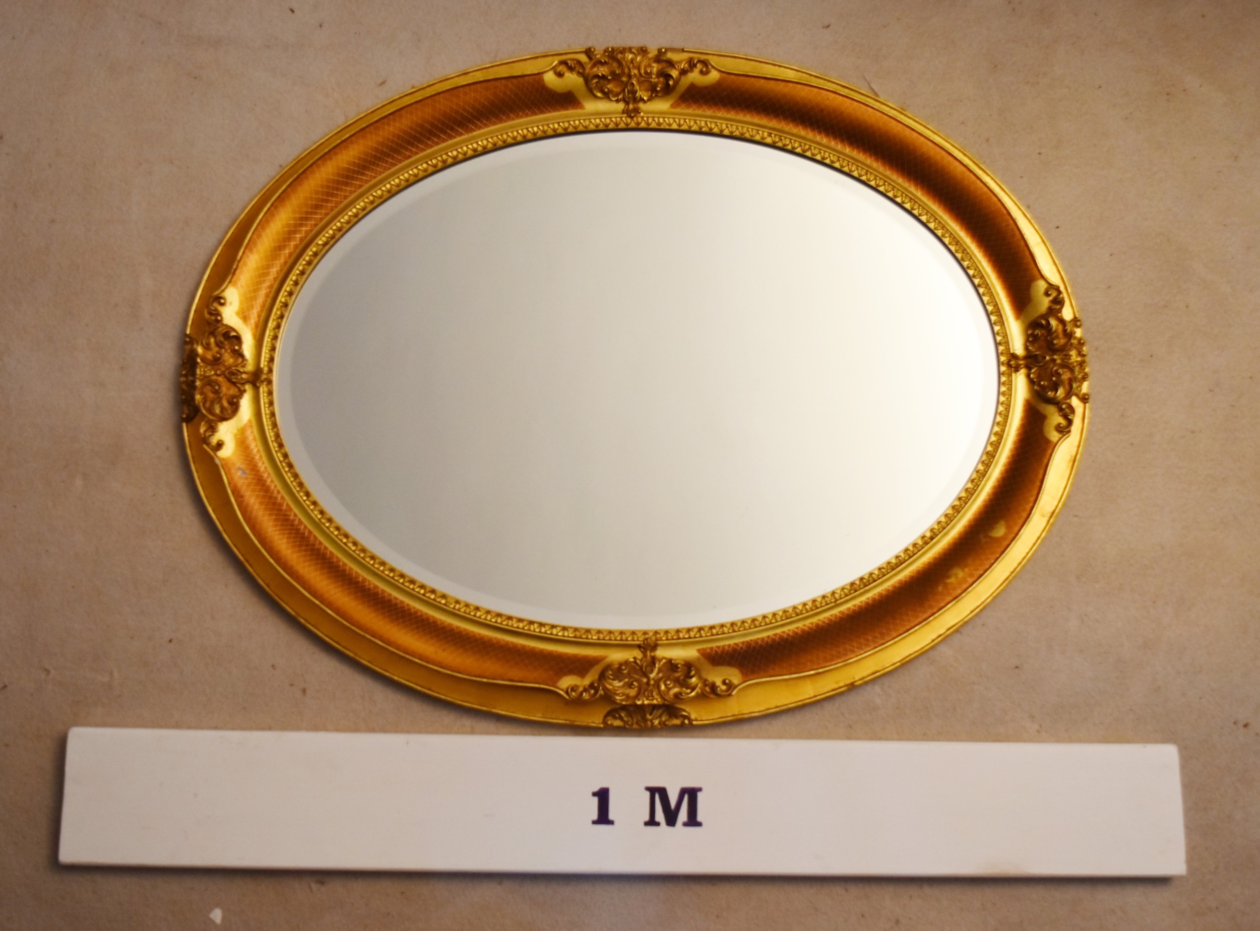 A contemporary oval wall mirror in gilt floral decorated frame. H.66 W.86cm - Image 9 of 10
