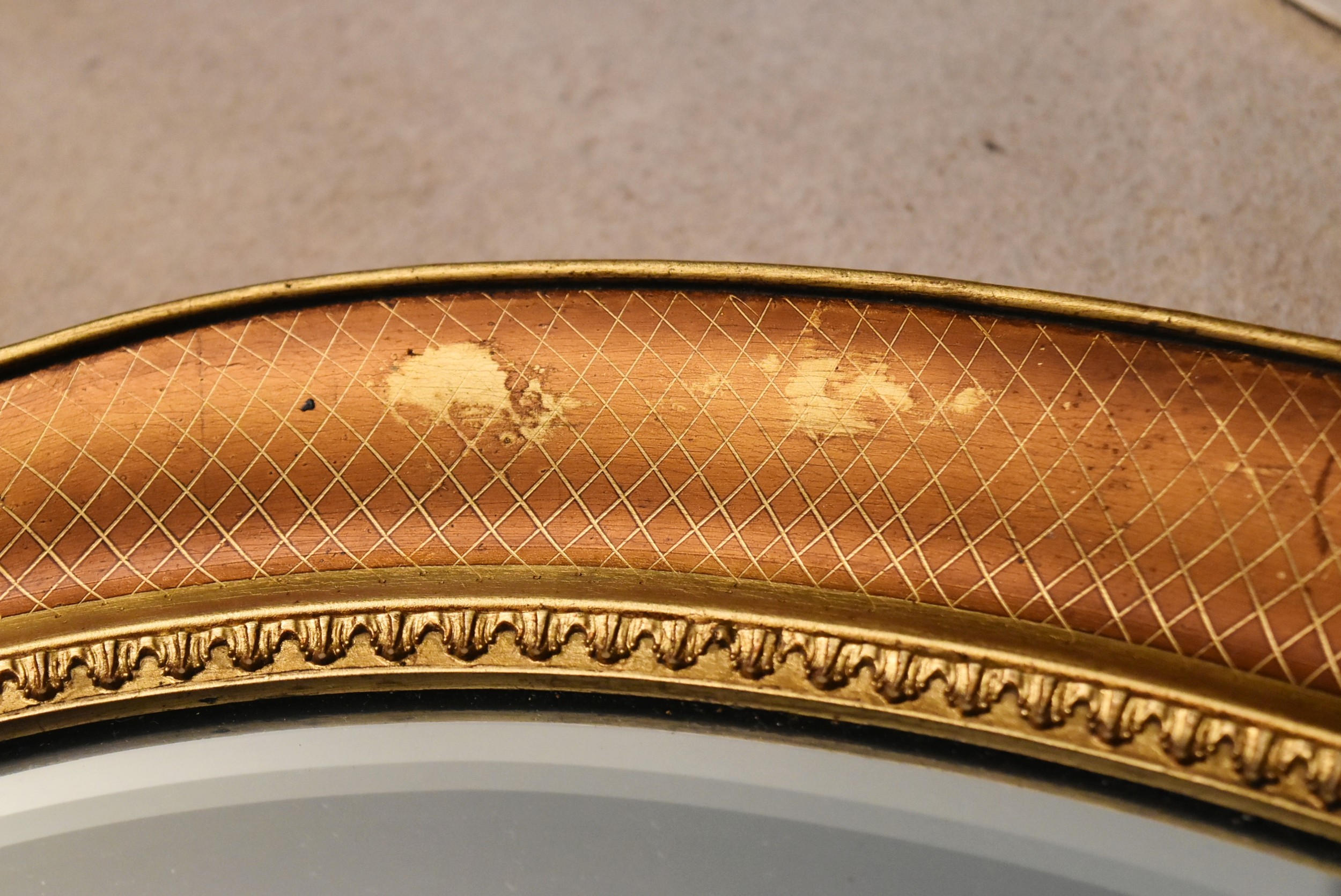 A contemporary oval wall mirror in gilt floral decorated frame. H.66 W.86cm - Image 10 of 10