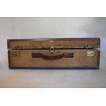 A vintage Hartmann Skymate leather bound suitcase. H.24 W.74 D.51cm