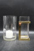 Two contemporary glass candle holders. To include a square glass candle holder designed by David