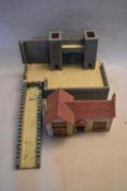 A vintage painted toy castle along with a vintage model of a country cottage. H.41 W.64 D.90cm