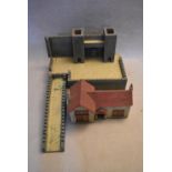 A vintage painted toy castle along with a vintage model of a country cottage. H.41 W.64 D.90cm