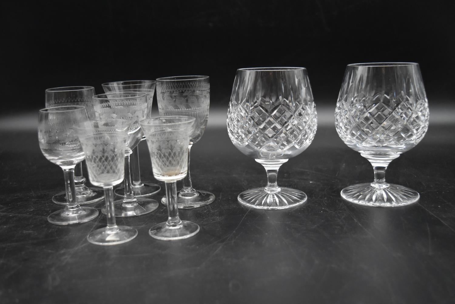 A pair of Stuart crystal cut brandy glasses with makers mark to base and a collection of five