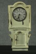 A contemporary painted American style wall clock. H.56 W.26 D.6 cm.