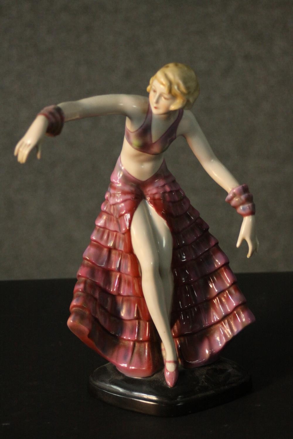 A Fasold & Stauch Bock, Wallendorf Art Deco figure of a young woman in a pink ruffle dress in - Image 2 of 8