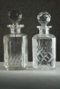 Two cut crystal decanters with stoppers. H.25cm.