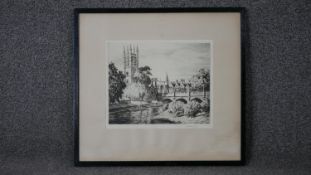 A framed and glazed etching of the River Cam depicting a punter in Cambridge. Signed T Mackenzie.